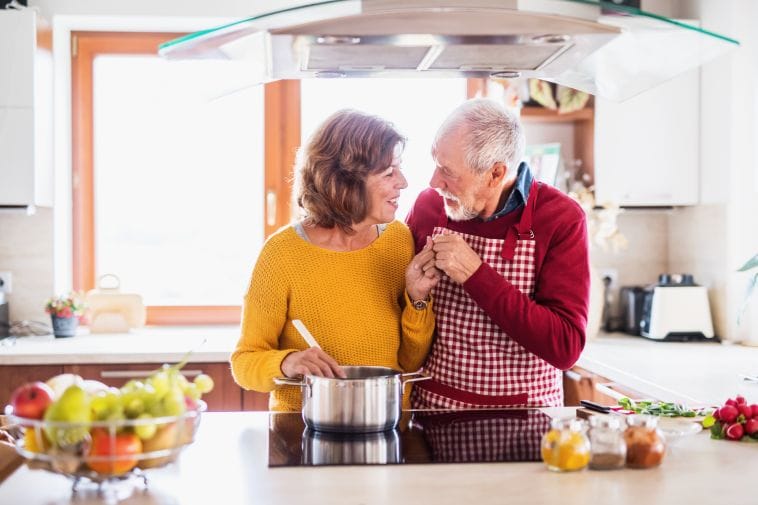 Senior couple cooking