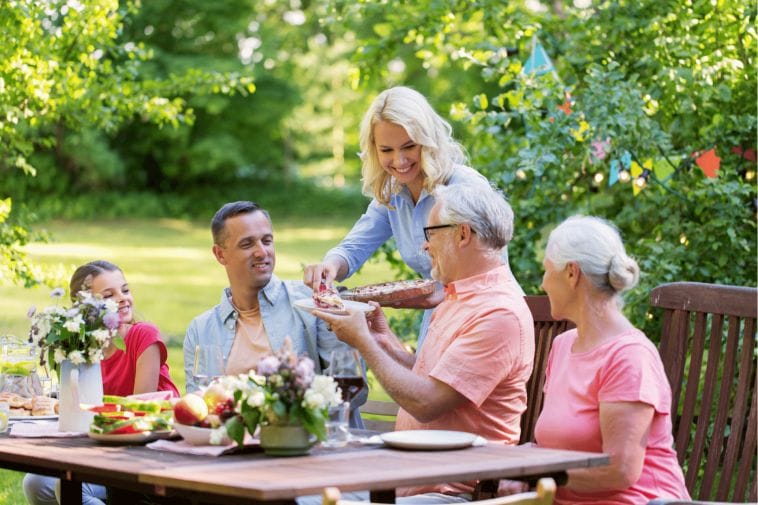 Seniors eating with family Seniors eating with family