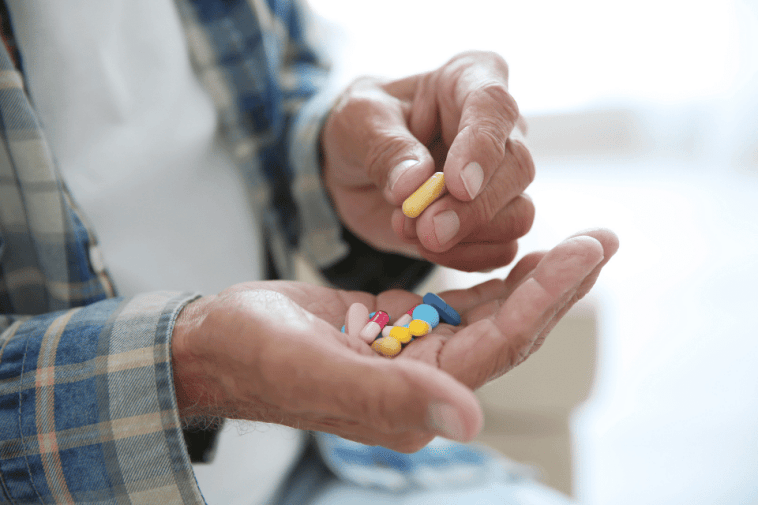 CKD Checklist: Senior holding pills 