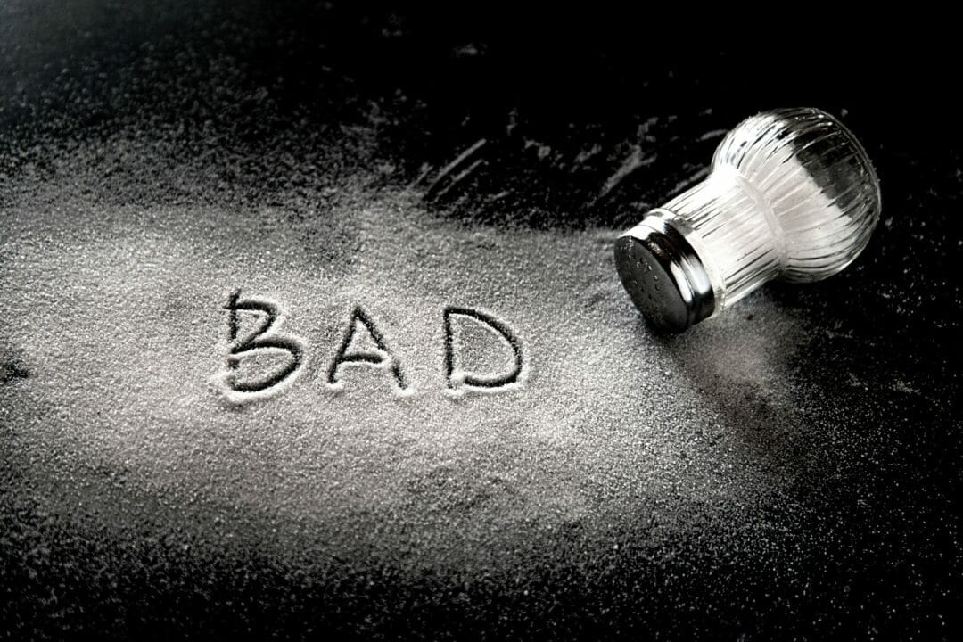 the word bad spelled out in salt