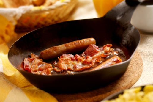 Bacon and Sausages in a pan Bacon and Sausages in a pan