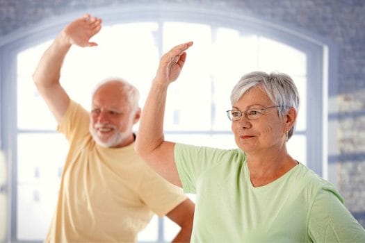 two old people exercising