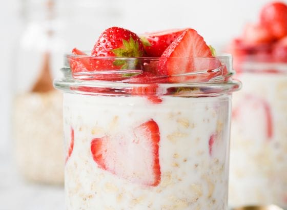 Strawberry oats in mason jars.
