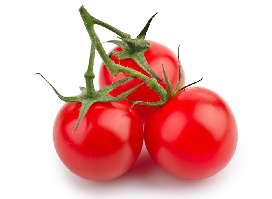 Three red tomatoes with CKD on a white background.
