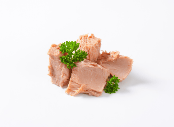 A piece of tuna on a white background.